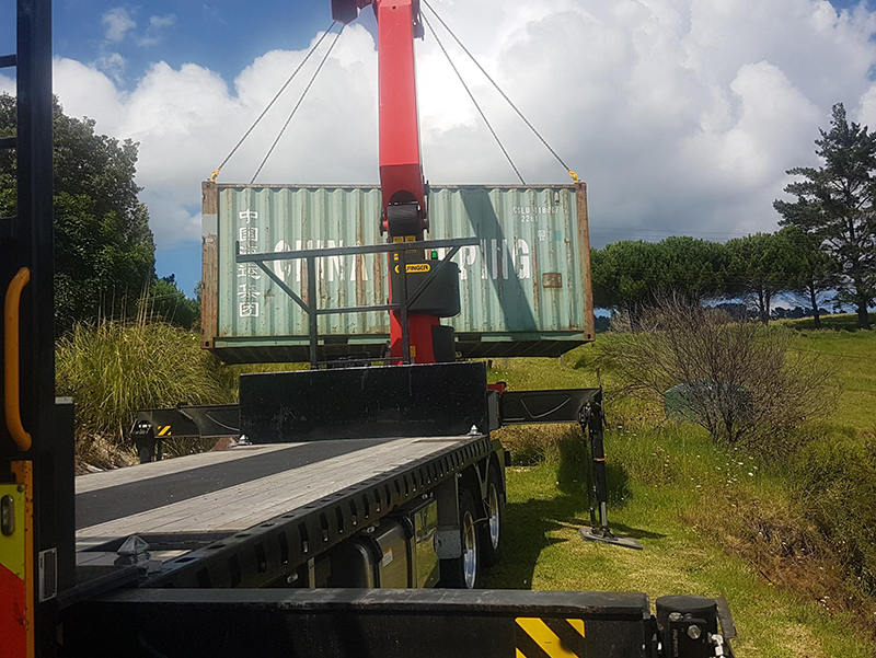 Hiab loading shipping container